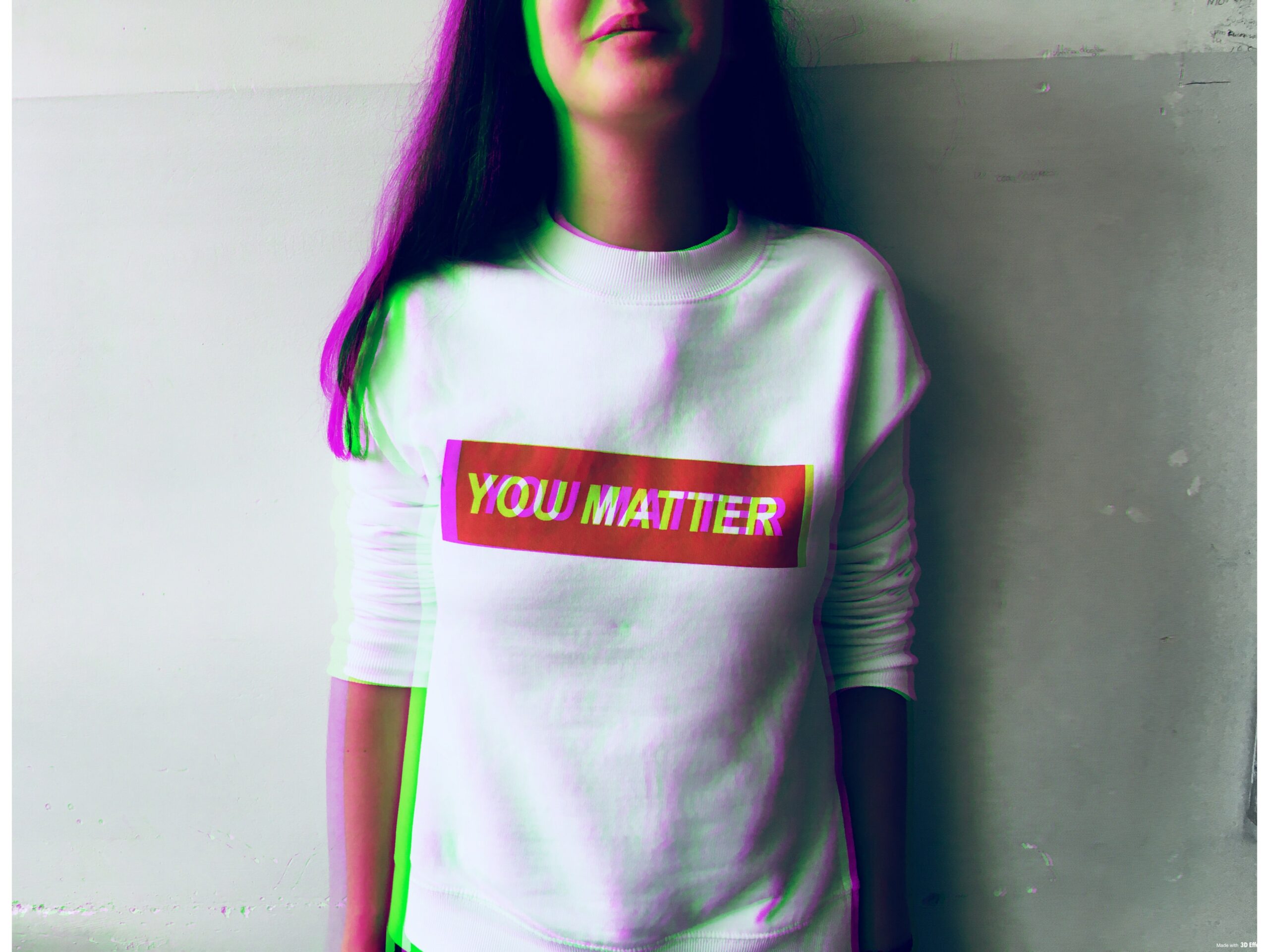 A person wearing a shirt that says you matter