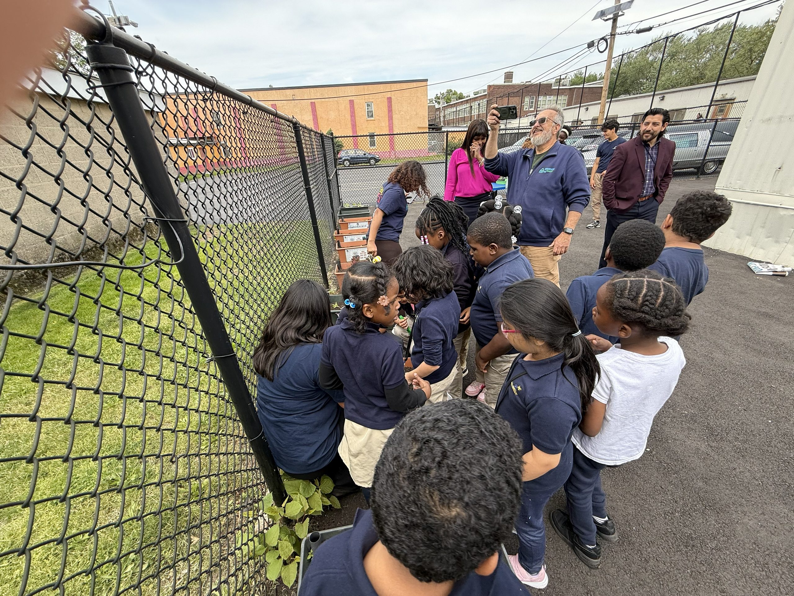 Photo of students from Winfield Scott No. 2 exploring their garden