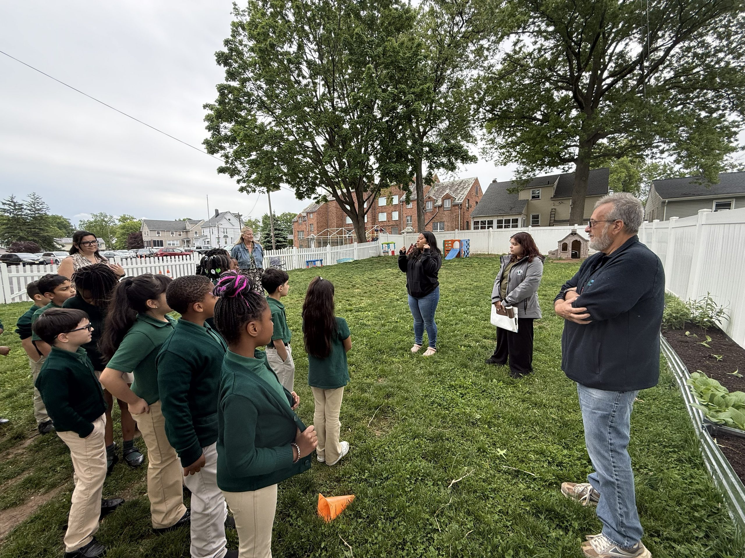 St. Joseph students taking instructions from teachers and Groundwork Elizabeth team