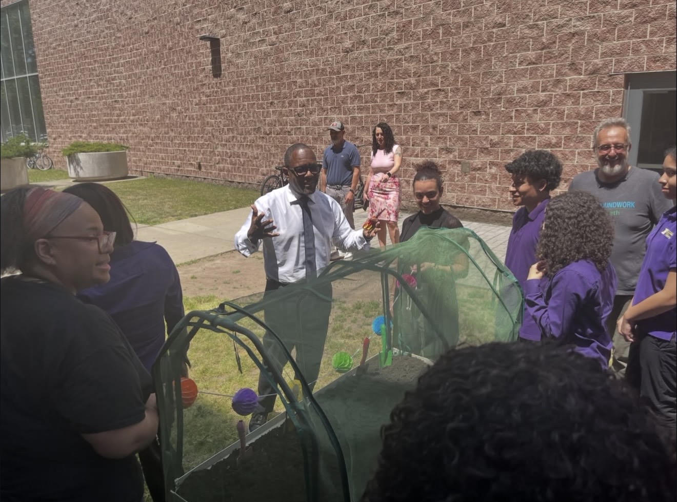 Commissioner Stanley Neron speaks with TJAA students 