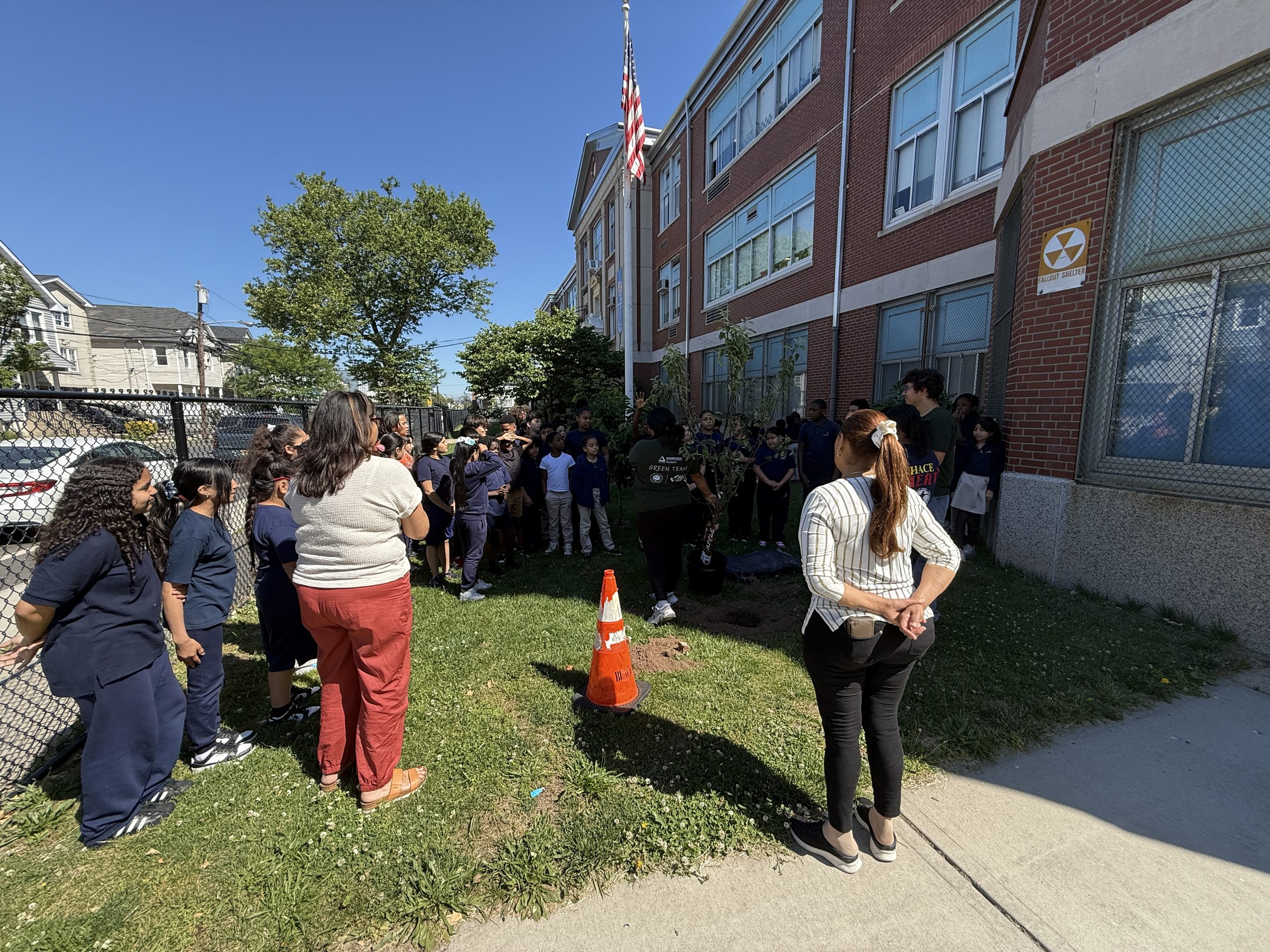 John Marshall School No. 20 students and faculty receive a presentation from Groundworks Elizabeth staff member, Ashley.