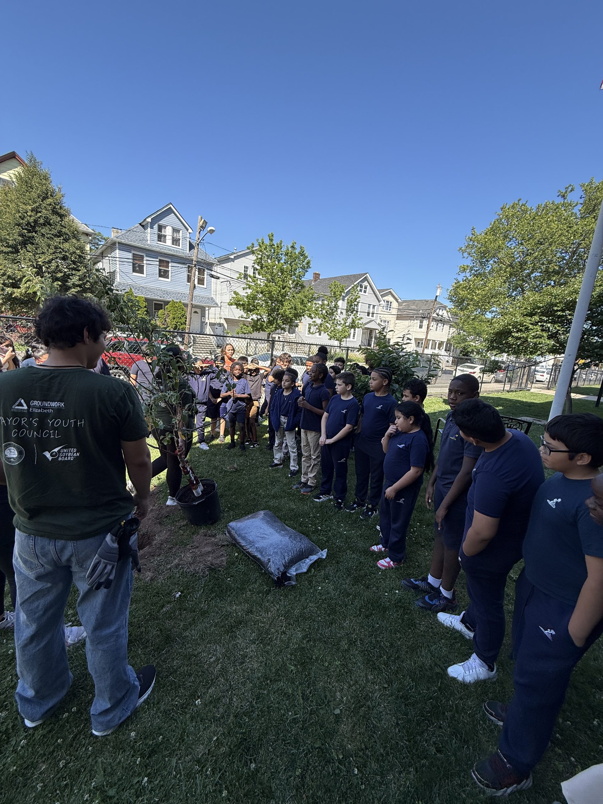 John Marshall School No. 20 students and faculty receive a presentation from Groundworks Elizabeth staff member, Ashley.