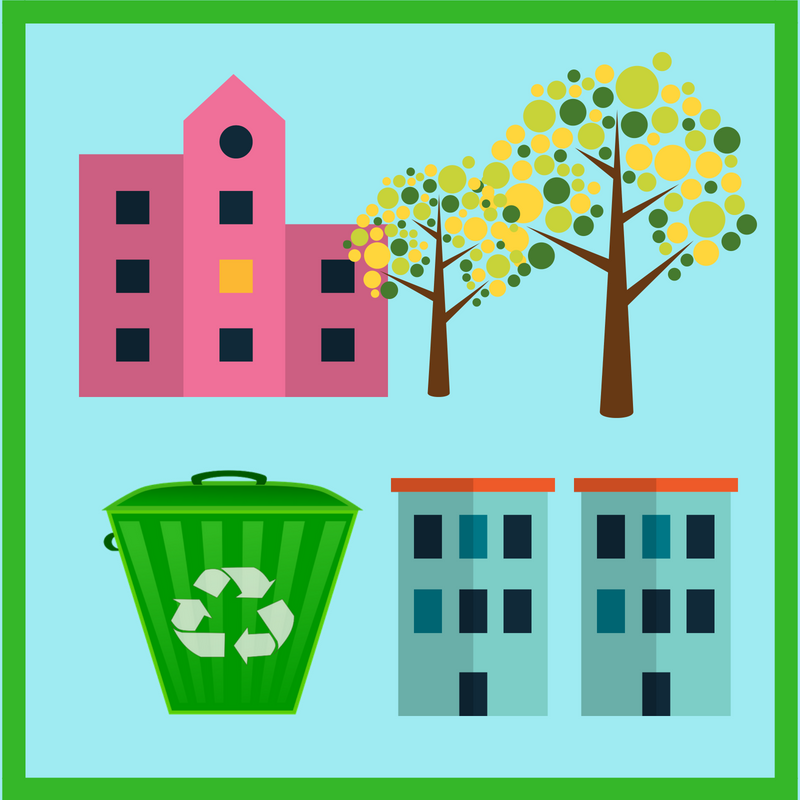 buildings, trees, and a recycling bin