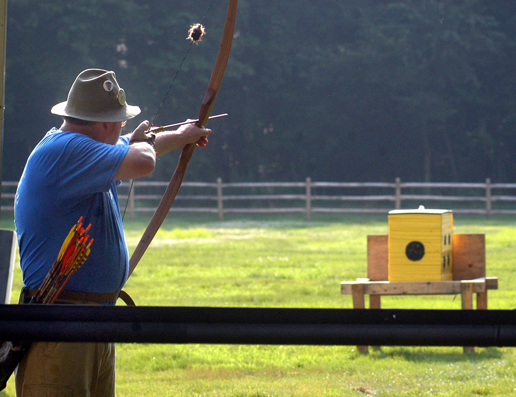 archer aiming at a target