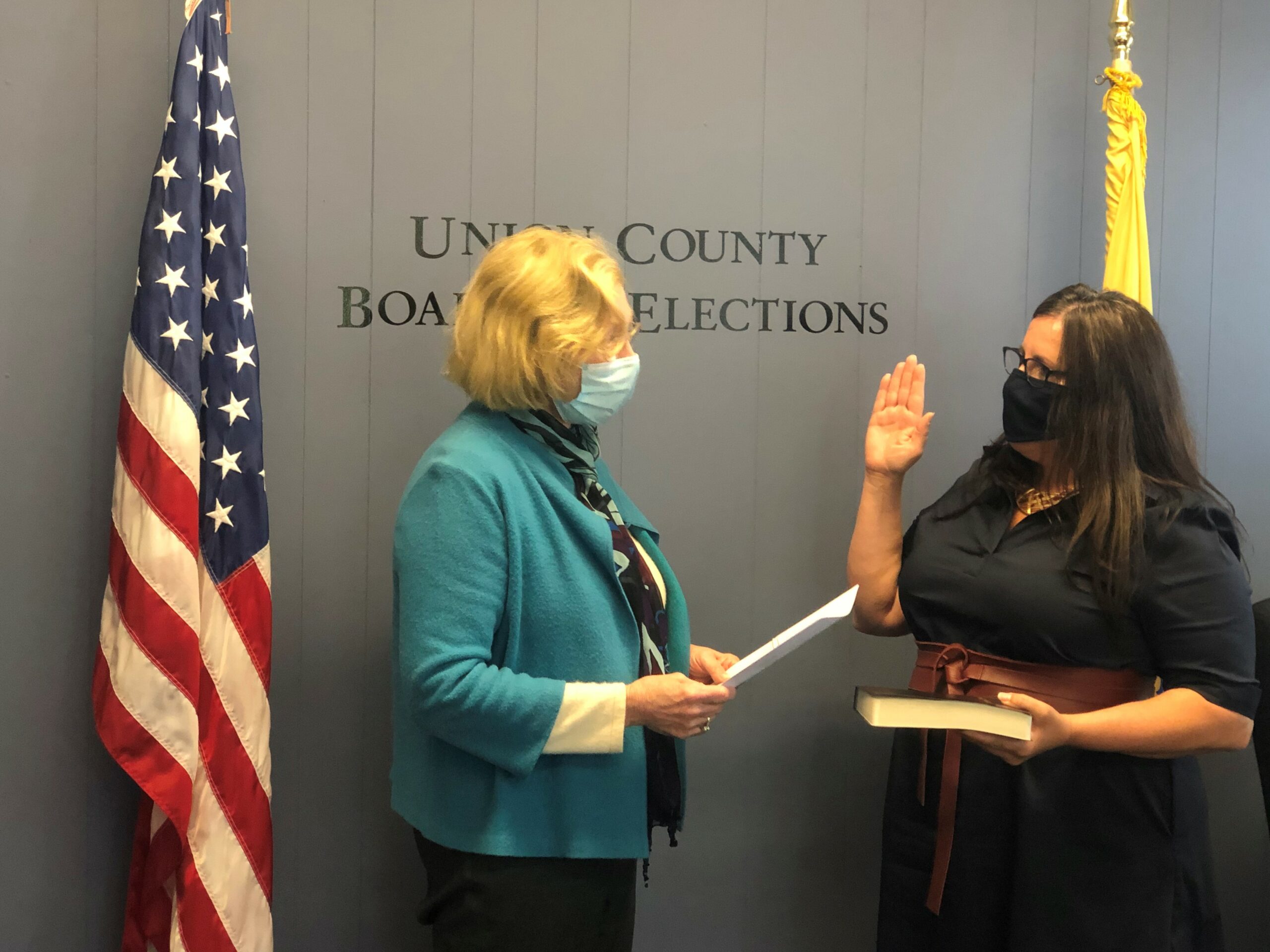 Debra Varnerin of Berkeley Heights takes the oath of office to serve as a Commissioner