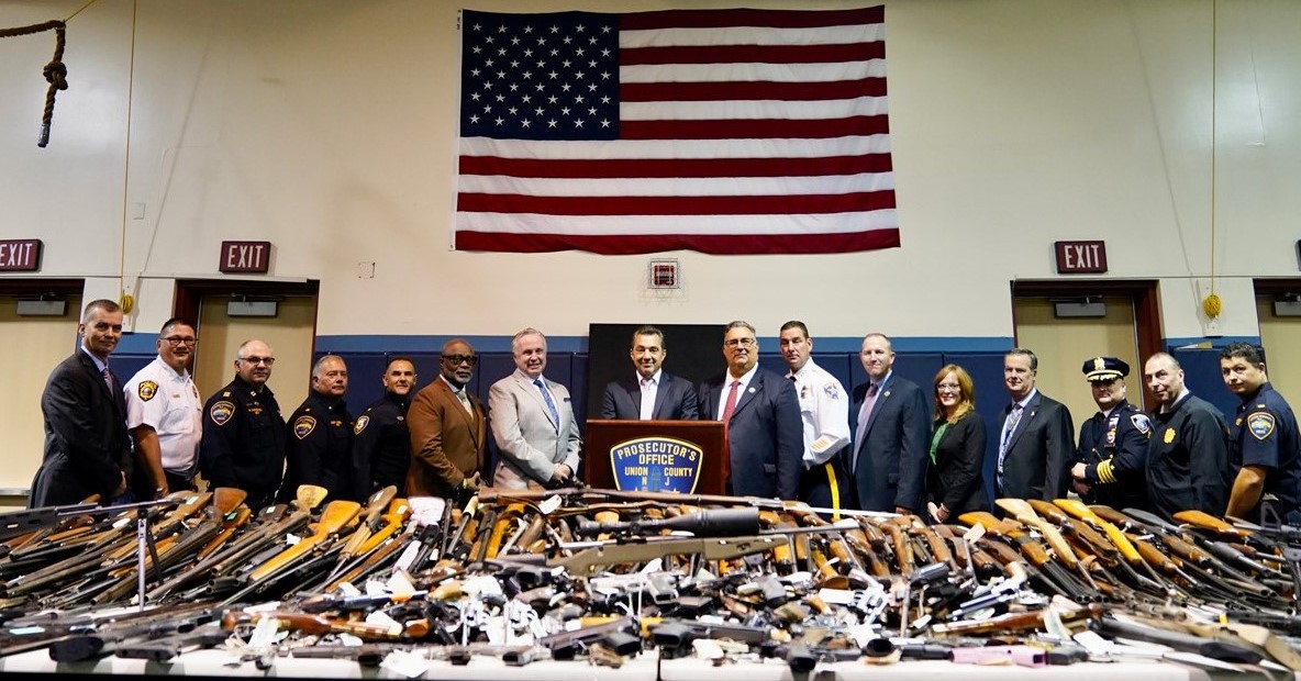 Union County Prosecutor William Daniel and Commissioner Board Chairman Alexander Mirabella joined with Commissioner Hudak, Public Safety Director Andrew Moran, Union County Sheriff Peter Corvelli and other County and local officials this morning to present more than 525 weapons collected last Saturday during the Union County Gun Amnesty Buyback event.
