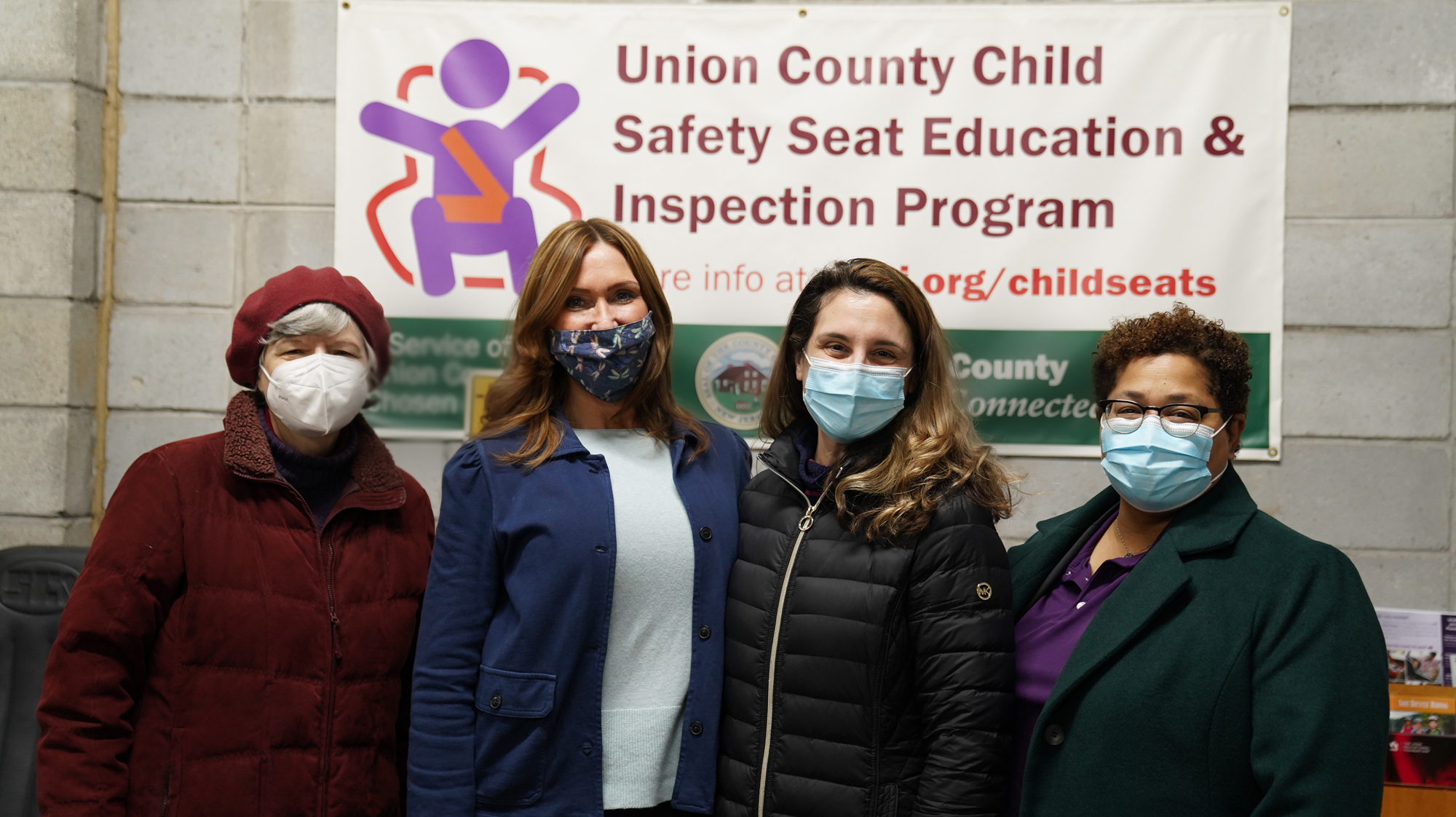 Commissioner Chair Rebecca Williams and Commissioners Kimberly Palmieri-Mouded, commissioner Bette Jane Kowalski, and Education Program Coordinator Christine Marcantonio standing for a photo