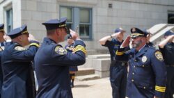 officers in a salute
