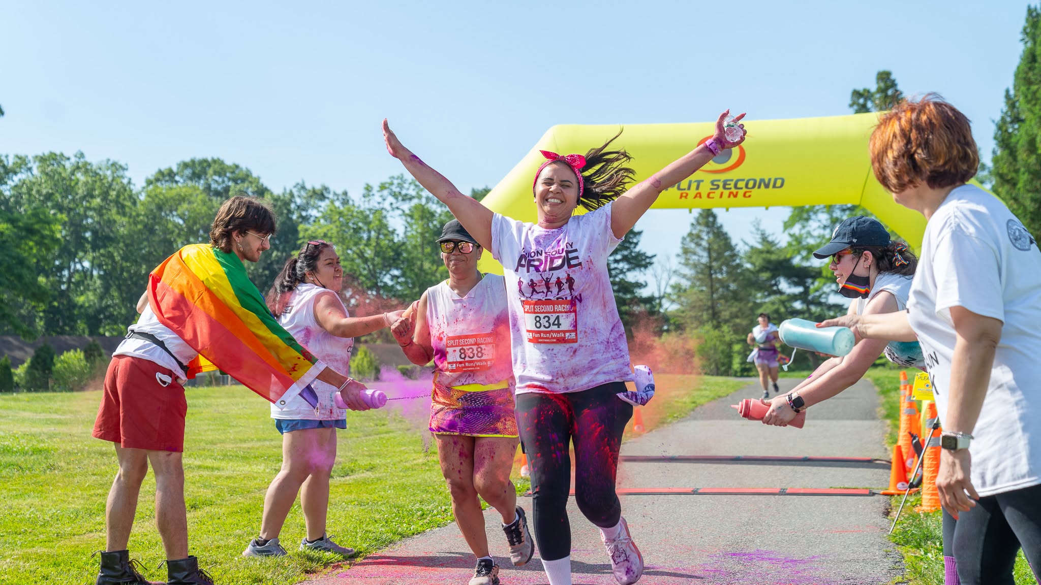 Photo of participants crossing the finish line at the 2026 Union County PRIDE 5K & Fun Color Run